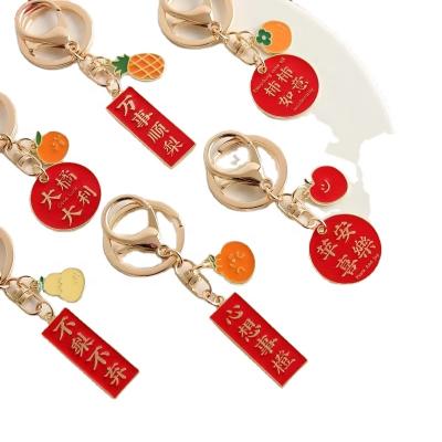 China Custom Metal Chinese Style Words Key Chain Colored Red Gifts Metal Key Holder for sale