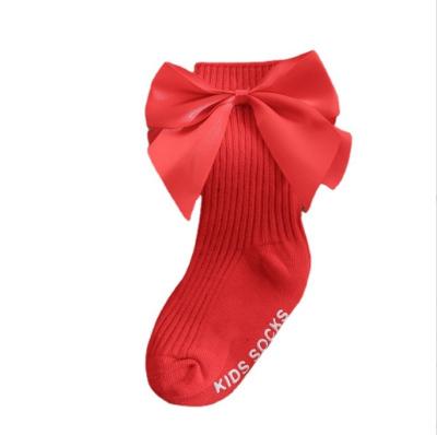 China 2021 Hot Sale Spain Antibacterial High Quality Kids Socks With Bow Midi Anti-skid Tube Baby Socks Wholesale for sale