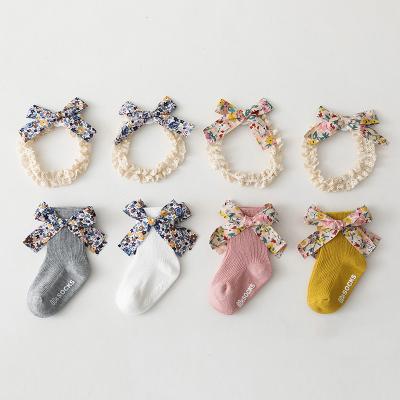 China 2021 QUICK DRY Floral INS Bow Baby Socks And One Piece Lace Headband Set Non-slip Organic Cotton Socks For Babies for sale