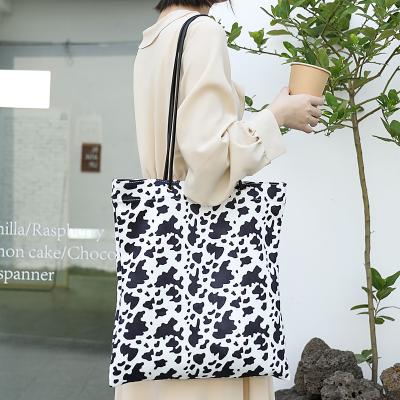 China Wholesale Creative 100% Polyester Cow Print Tote Bag New Style Shopping Lady Bags Handbag Tote Bags for sale