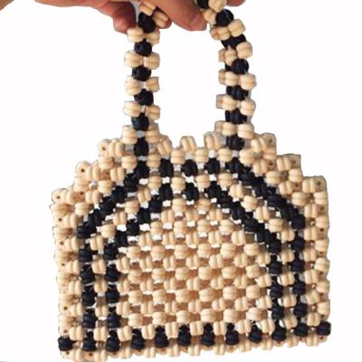 China Eco-Friendly Black Beige Wooden Beaded Handbag Women Handmade Tote Bag Pearl Beach Tote Bag Handle Handbag Small for sale