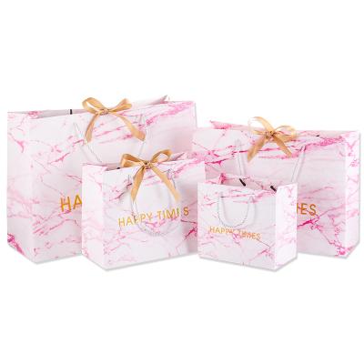 China Recyclable Marble Pattern Happy Times Print Ribbon Handle Paper Wedding Gift Bag Can Custom Logo for sale