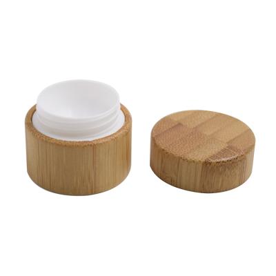 China High quality personal care 30g 50g 100g engraving logo bamboo jar with plastic inner jar PET jar for sale