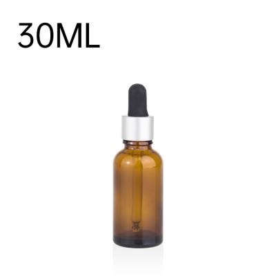 China Personal Care Custom Essential Oil Bottle 30ml 50ml 100ml Oil Perfume Bottle With Silver Aluminum Collar for sale