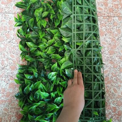 China Anti-UV Synthetic Plant Type Artificial Green Leaf Fence Grass Wall For Indoor Outdoor Decoration for sale