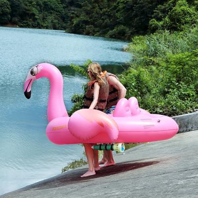 China Swimming Pool Amazing Resistance Long Motorized Flamingo Inflatable Pool Float for sale