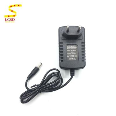 China DC12V 2A JSY-1220 Power Adapter US EU 2 Pin Wall Mount Plug AC Adapter Power Supply for sale