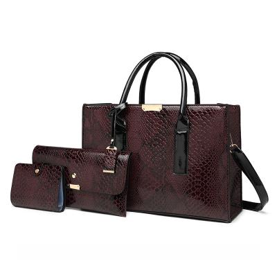 China 2021 New Fashion Fashion Python Bag 3 In 1 Set Designer Woman Handbag for sale