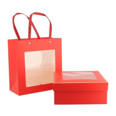 China Recycled Materials Multi Color Specifications Customizable Cardboard Paper Gift Bags With Handle for sale