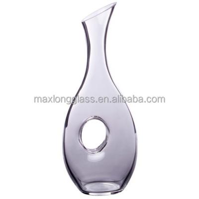 China New Design Blown Hollow Hole Mouth Glass Decanter for sale