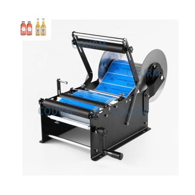 China Mt-50 Widened Type Label Sticking Machine For Round Bottle Manual Labeling Machine Wine Bottle Sticker Label Small Packing Machi for sale