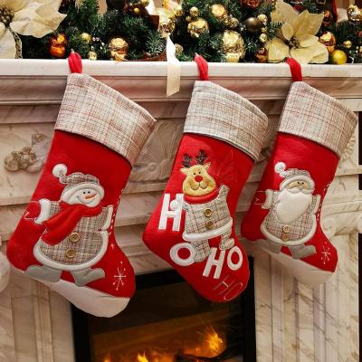 China Christmas Stockings Set of 3 Character 3D Plush Linen Hanging Knit Border Plush Faux Fur Cuff Stockings for Home Decor for sale