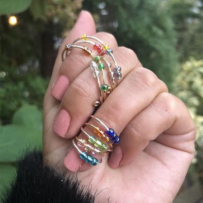 China 5PCS Environmentally Friendly Relax Pressure Glass Beaded Ring Reduce Anxiety Fidget Adjustable Folding Bead Rings Exquisite Jewelry For Women Girls for sale