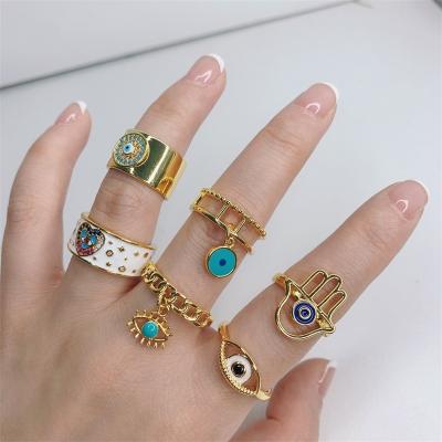 China 2022 Hot Sale Fashion Trendy Popular Black And White Drip Real Oil Gold Plated Zircon Love Demon Eye Micro-Inlaid Ring For Girls for sale