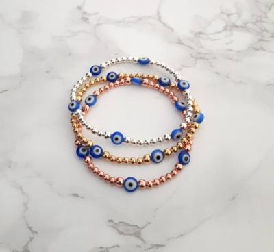 China CLASSIC Inspire Stainless Steel Jewelry Blue Eye Stretch Bracelet Gold Plated Steel Beads Bracelet for sale