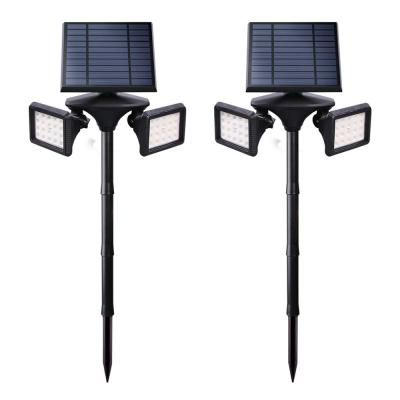 China Garden Spotlight New Product Solar Power Energy Saving Double Heads Led Outdoor Lawn Spike Solar Spot Lights for sale