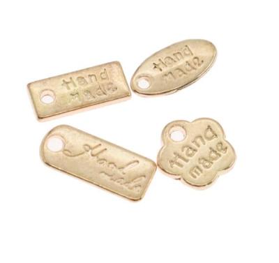 China Sustainable Hongmei ME011 Customized Metal Hanging Chain Label For Clothing Bag Accessories for sale