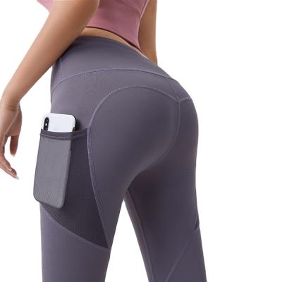 China Breathable Wholesale Women High Waist Gym Wear Tight Fitness Yoga Pants Leggings With Pockets for sale