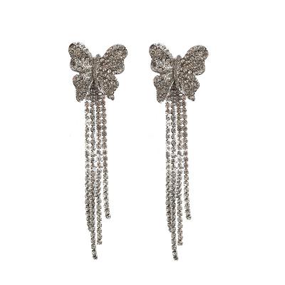 China FASHIONABLE Europe and American dinner butterfly diamond temperament clean red ladies simple heavy snap earrings fringe wrap earrings for sale