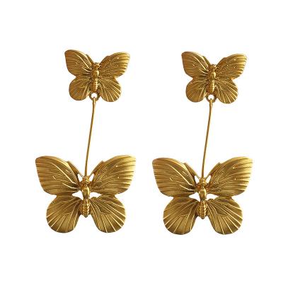 China Vintage European and American medium three-dimensional butterfly double gold plain design niche exquisite exaggerated earrings for sale