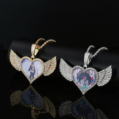 China Hip Hop Environmental Friendly Diamond Heart Photo Necklace Men Personalized Picture Necklace With Wings for sale