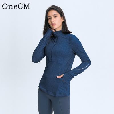 China Breathable Women Workout Sports Shirts Half Zipper Yoga Crop Reflective Soft Tops With Thumb Holes for sale