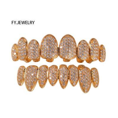 China Hiphop Fashion Copper Grillz Sets Iced Out Dental Trendy Unisex Irregular Fangs Grillz Wholesale Gifts Body Jewelry for sale