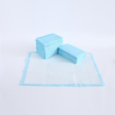 China Puppy Training Pad White Pink Blue Fiber Stored Training Pad Urine Stored Training Pad for sale