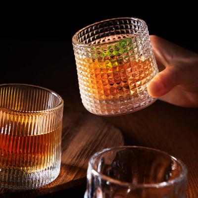 China Retail Spiral Bar Classic Clear Whiskey Glasses In A Variety Of Styles Designs Decompression Beer Glass Rotary Cocktails for sale