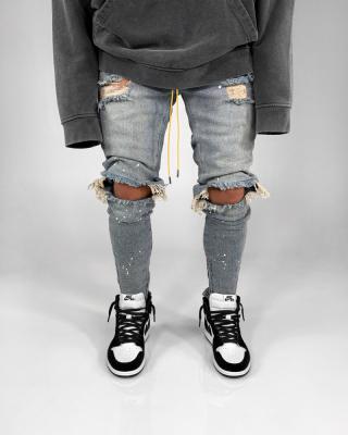 China QUICK DRY mens street style jeans destroyed skinny ripped denim pants fashion jeans slim fit drawstring jeans for men for sale