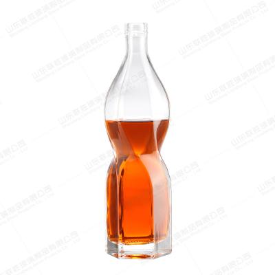 China Botellas de vidrio de vino de 300 ml de color cápsula de PVC encogida tamaño personalizado en venta