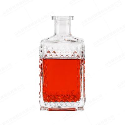 China Glass Lid Square Liquor Bottle for Tequila Whiskey Unique and Elegant Design for sale