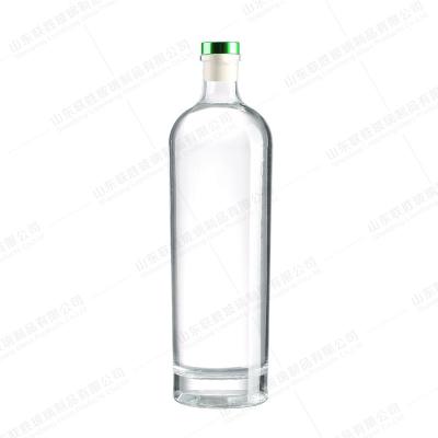 China Design Short Neck Thick Bottom Craft Fine Wine Glass Bottle with Colored T Tap for sale