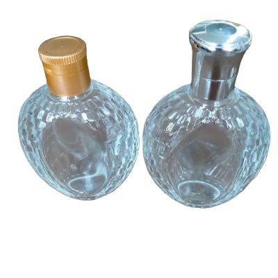 China Other Beverage 50ml/100ml Dark Blue Glass Perfume Bottles with Screw Cap Round Design for sale