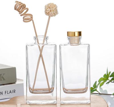 China Industrial Beverage 50ml Flat Square Glass Diffuser Bottle with Rattan Dried Flower for sale