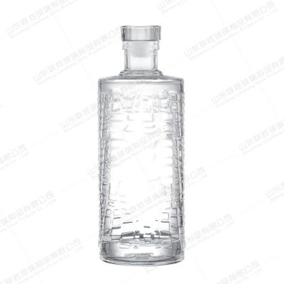 China Sello de corcho 700 ml botella de vidrio vacía personalizada para vodka ginebra whisky tequila licor en venta