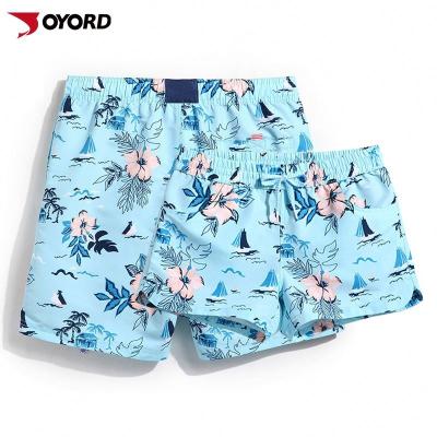 China Custom Pocket Couples Swimwear Printing Couples Swimwear Beach Quick Dry Breathable Shorts Anti-UV for sale