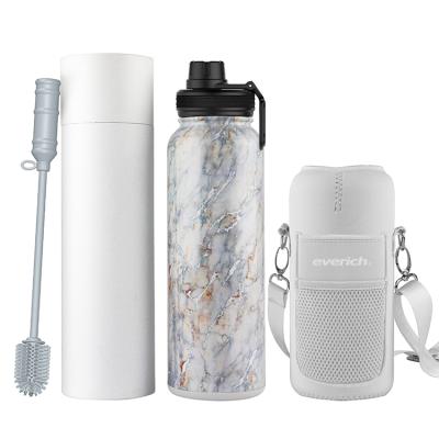 China New PORTABLE sport bottle set 18/8 stainless steel water bottle with brush and bag for sale