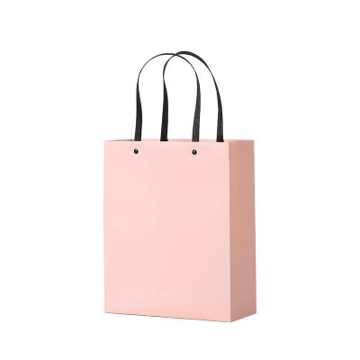 China Recyclable Custom Luxury Clothing Retail Bag Packing Gift Bag Bolsas De Papel Pink Packaging Paper Bags With Handles For Clothes for sale