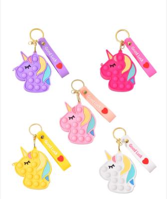 China Portable Minisize Silicone Kids Toys Push Up To Relieve Hand Wallet Toys Gifts Stirring Coin Purse Rainbow Person Unicorn Bag for sale