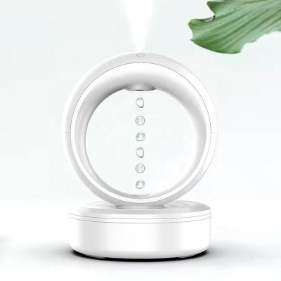 China Car Bedroom Night Light Essential Oil Aromatherapy Diffuserrain Can Water Drop Anti-Gravity Humidifier for sale