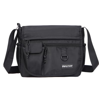 China Wholesale New waterproof fabric men's bag fashion cross-body bag boys shoulder bag students schoolbag for sale