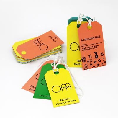 China Viable high quality custom brand printed hang die cut labels design label 400gsm color coated paper hangtags for apparel own logo for sale