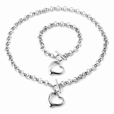 China Hot Selling Environmental Friendly Fashion OT Buckle Stainless Steel Jewelry Set Heart Necklace Silver Titanium Steel Bracelet Set For Women for sale