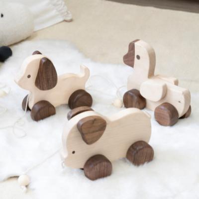 China Europe unique design of children's pull toys cute wooden animal trolley toys for sale