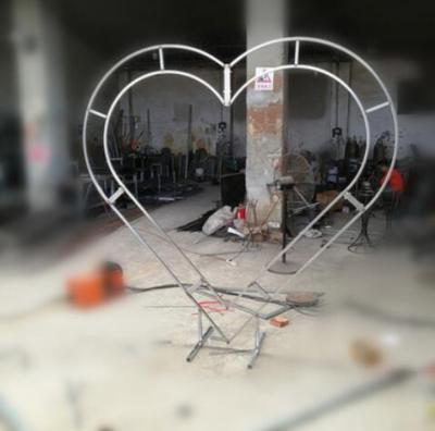 China Heart-shaped iron core peach core love arch wedding truss arch special-shaped frame steel heart-shaped door frame for sale