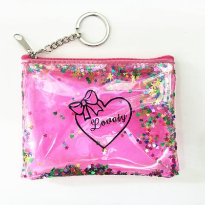 China New promotional bag promotional giveaway adorns transparent PVC glitter coin sequin bag with key ring for sale