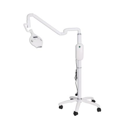 China Mobile Portable Rotating Arm LED Cold Light Dental Wheel Style Laser Teeth Whitening Machine for sale