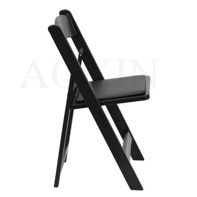 China Modern black color wedding plastic chair for event for sale