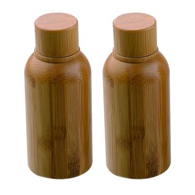 China Full bamboo glass jars essential oil bottle with bamboo screw cap for sale